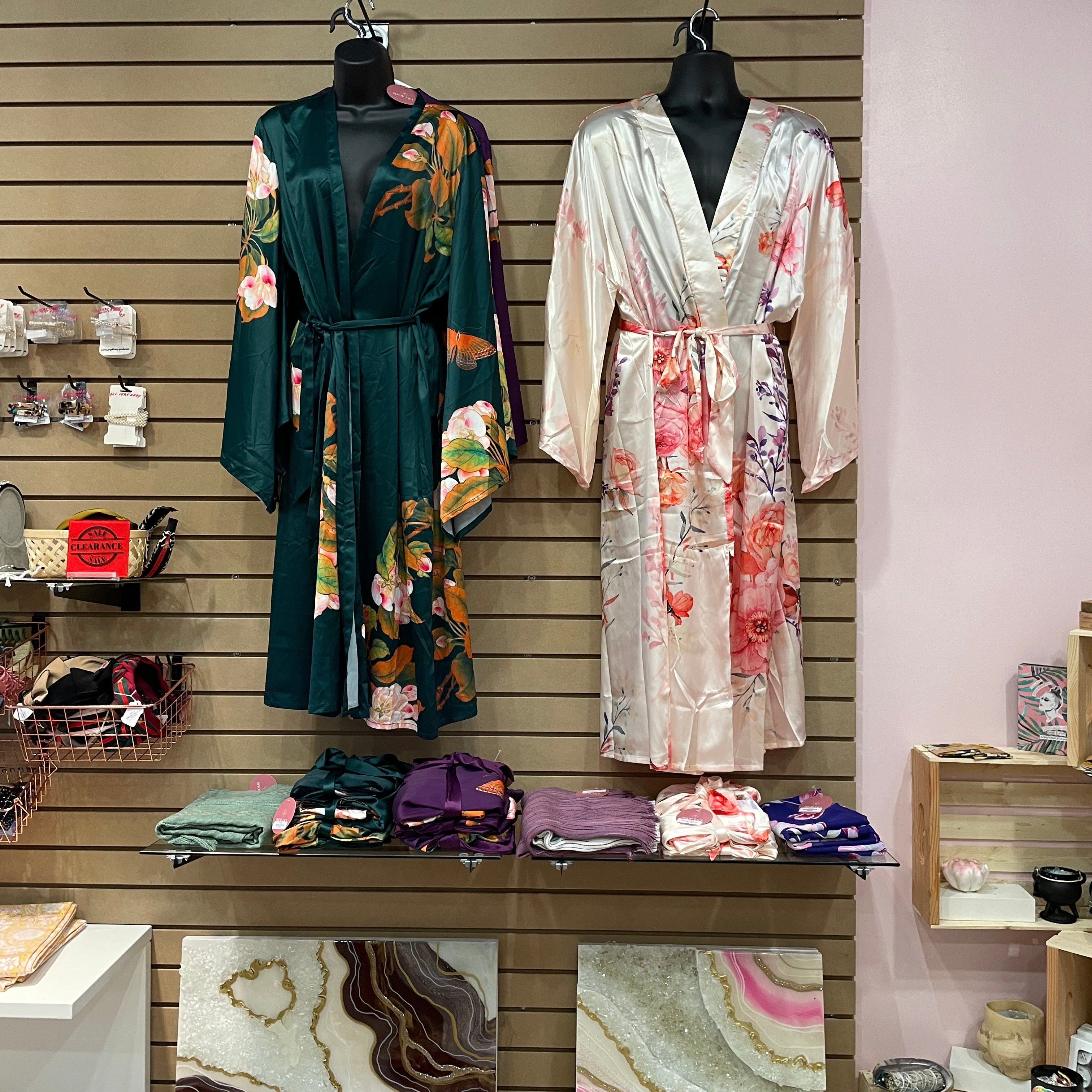 Long floral kimono robes displayed at store front, Shop T.K.S