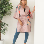 woman in tied pink kimono and loungewear