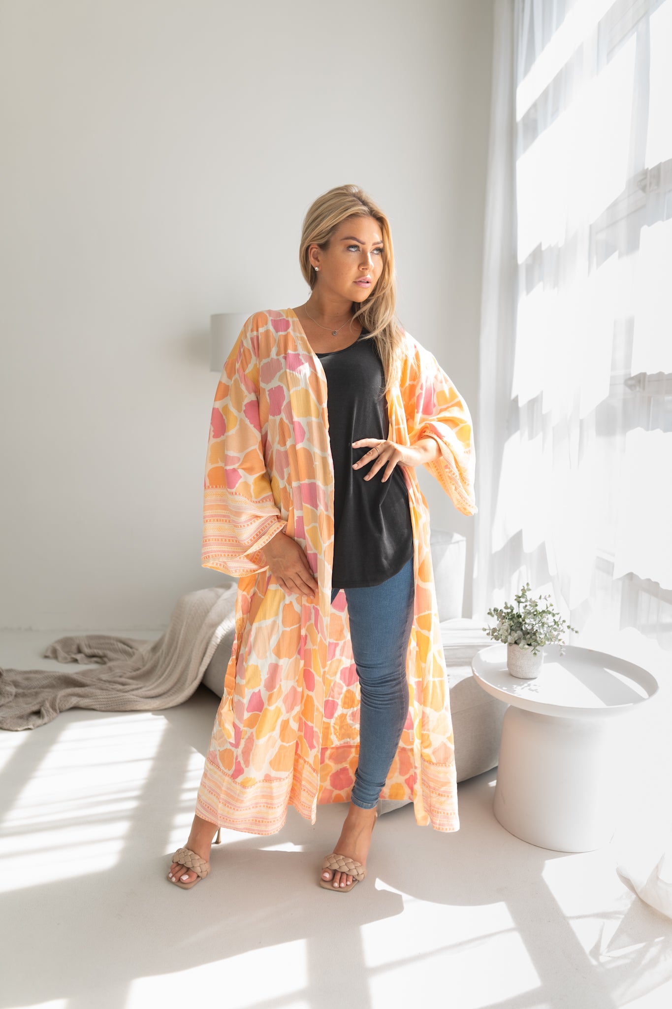 Woman wearing Orange and pink leopard print beach cover up, Shop TKS