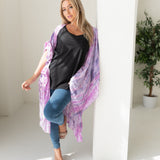 Woman wearing purple tie dye beach cover up, Shop TKS