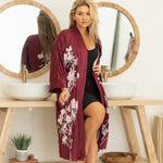 Woman wearing floral with burgundy robe and untied, Shop TKS