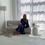 video of woman wearing long blue kimono