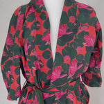 video showing waterlily pink and green print kimono robe from Shop T.K.S.