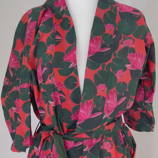 video showing waterlily pink and green print kimono robe from Shop T.K.S.