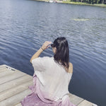 Video of a woman in a beach coverup, light purple ombre kimono dress. Maternity clothing.