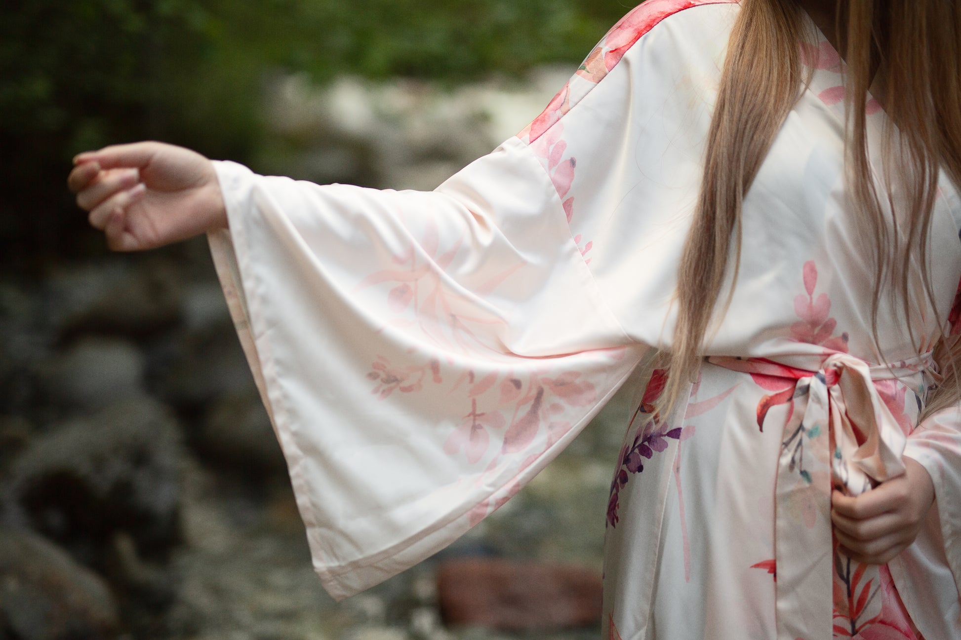 Close up of women's kimono sleeve robe with florals, Shop T.K.S