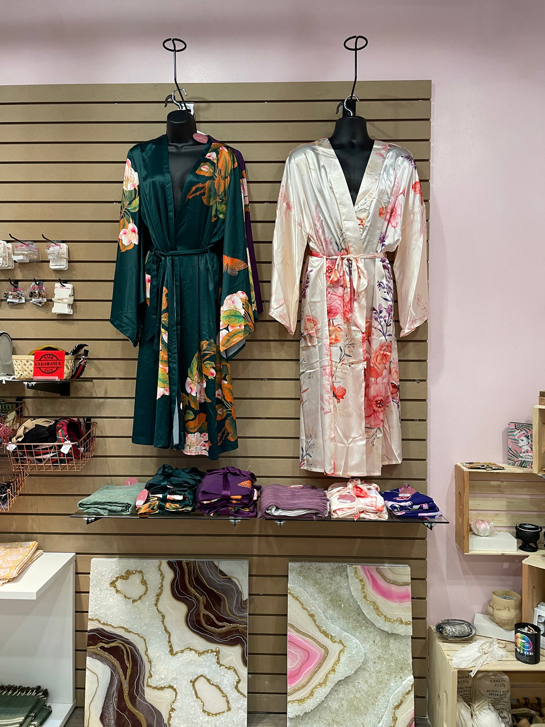 Long floral kimono robes displayed at store front, Shop T.K.S