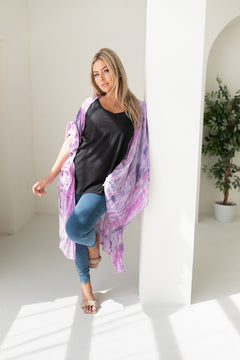 Woman wearing purple tie dye beach cover up, Shop TKS