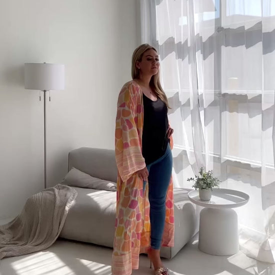 video of woman modeling boho print kimono robe