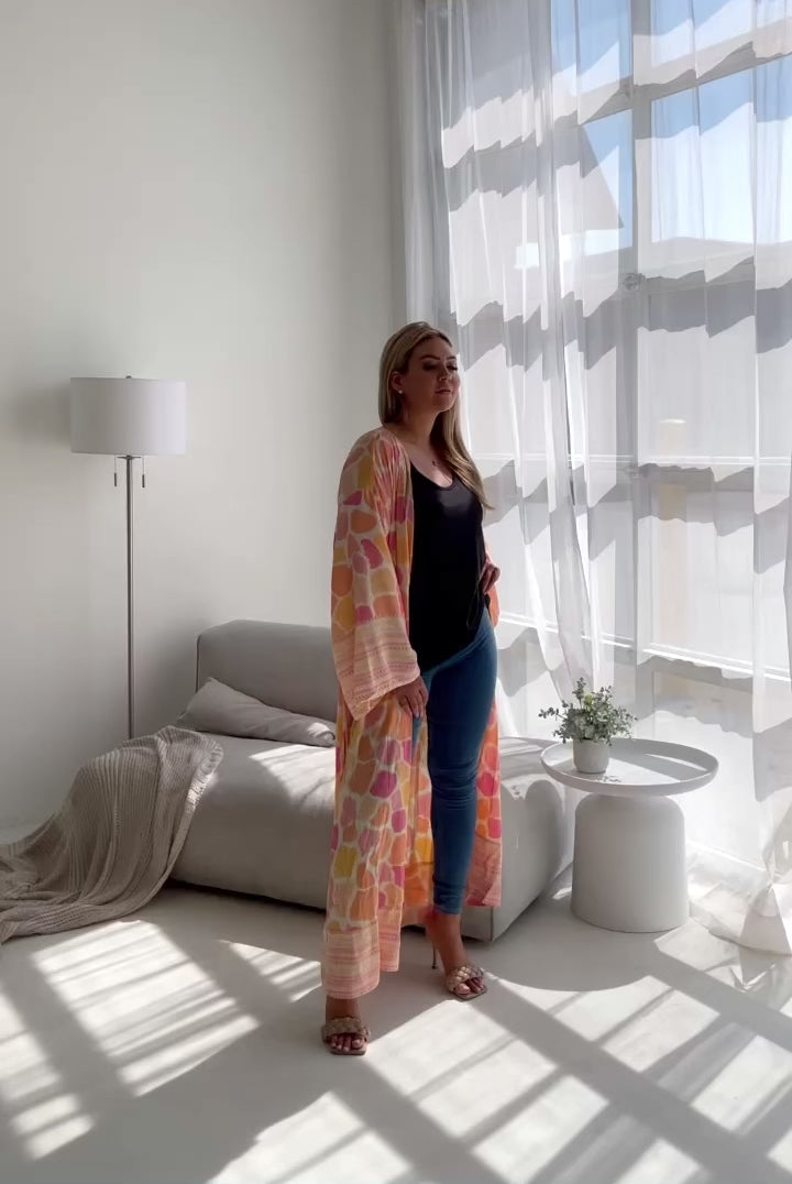 video of woman modeling boho print kimono robe